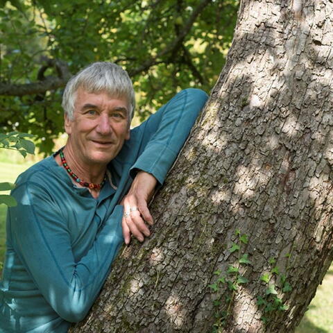 Archie Miles leaning against a tree