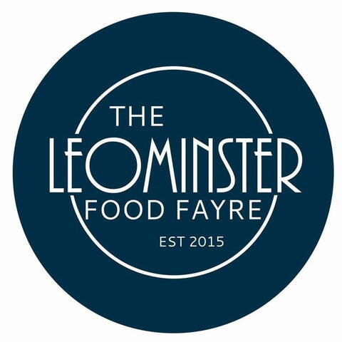 Leominster Food Fayre logo in art deco style font - white on dark blue background