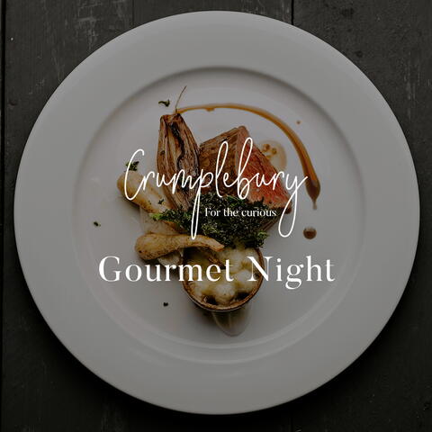 Gourmet dish on a dark grey plate