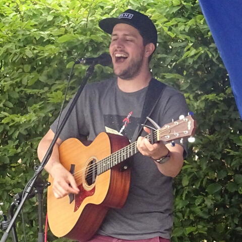 Person playing a guitar