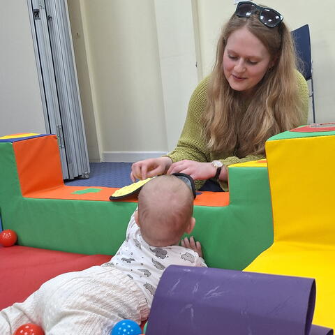 Adult and young child at play