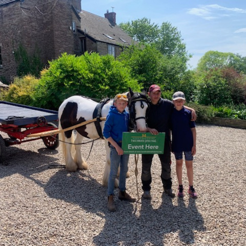 People with a traditional farming horse and cart 