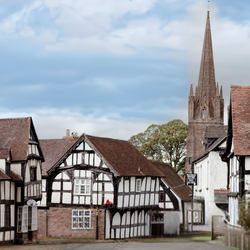 Quaint Herefordshire village scene with houses and a church