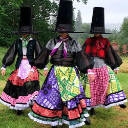 Three women in outfits