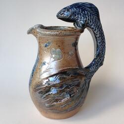 Fish shaped ceramic jug
